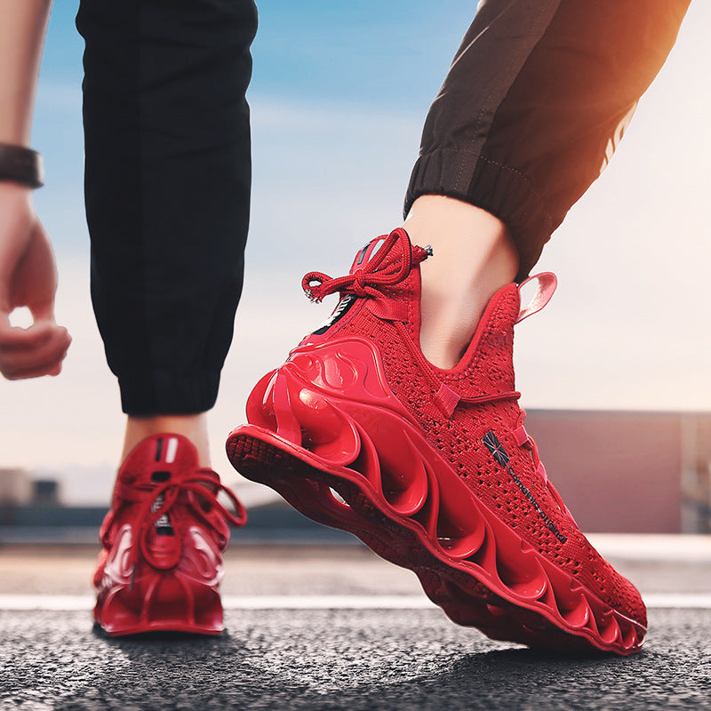 Man wearing vibrant red Sports shoes running shoes with a breathable design and unique sole pattern, suitable for activewear and comfortable running outdoors.