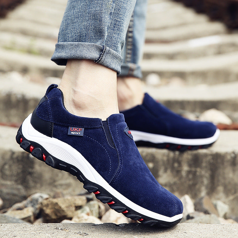 Mountain shoes outdoor men's shoes lazy shoes in navy blue suede with slip-on design and thick white and black soles, ideal for casual outdoor wear.