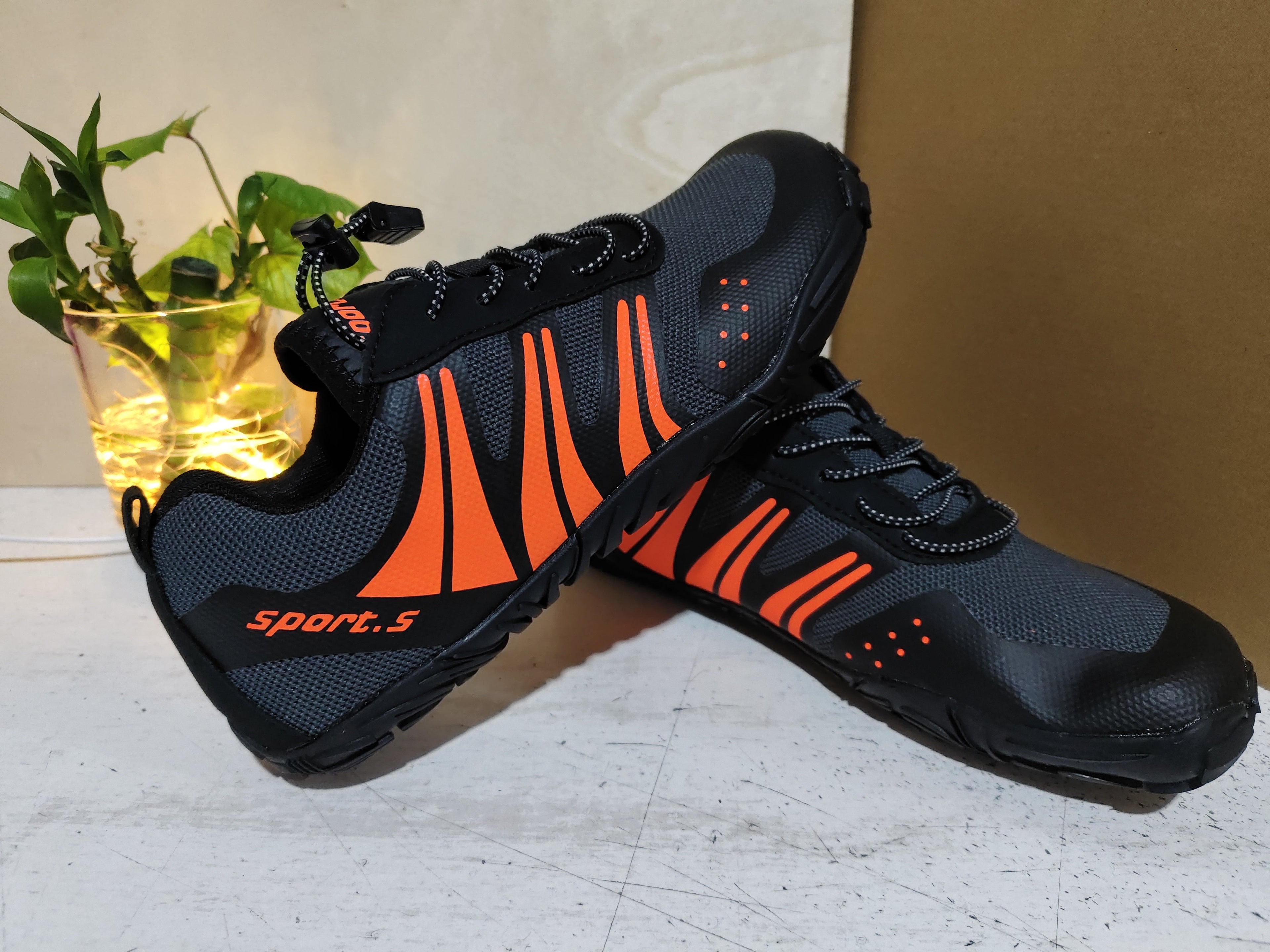 Black and orange Outdoor Wading Shoes, Quick-drying Shoes, Beach Shoes, Hiking Shoes, Fishing Sports Shoes with durable soles designed for versatile outdoor activities.