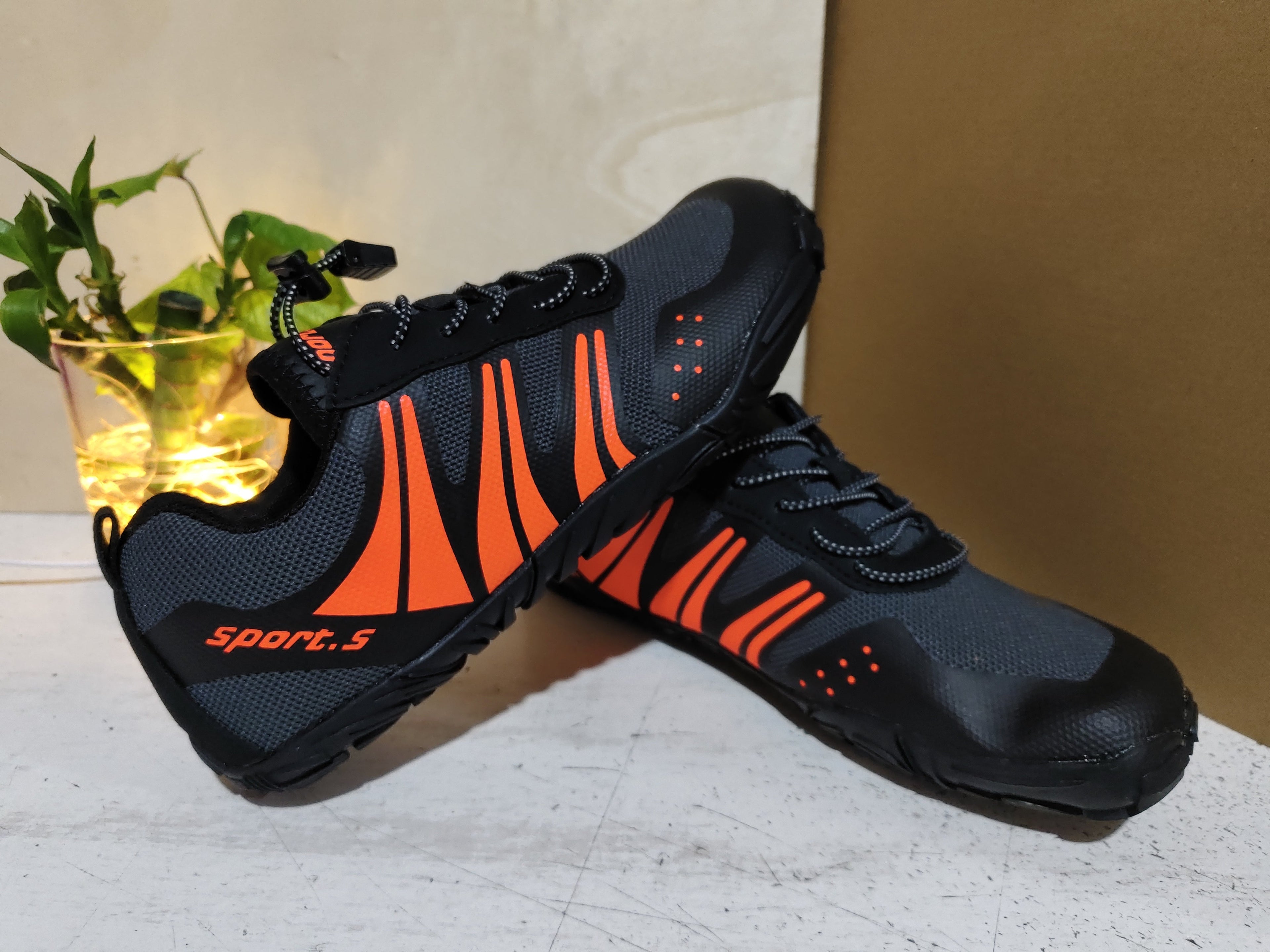 Black and orange Outdoor Wading Shoes, Quick-drying Shoes, Beach Shoes, Hiking Shoes, Fishing Sports Shoes with durable soles and breathable mesh upper, ideal for water and outdoor activities.